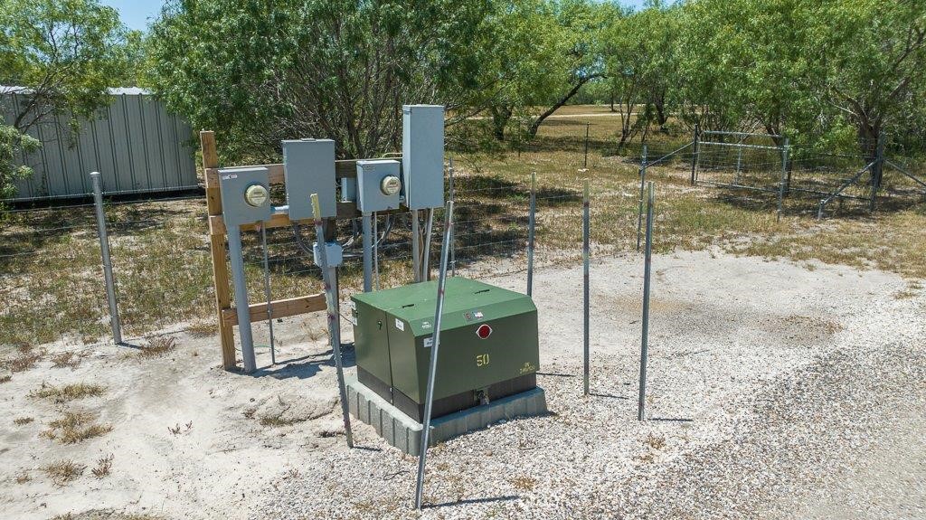 9223 County Road 2249 Sinton, TX 78387 - Photo 9 of 39 a small garden covered with tall trees