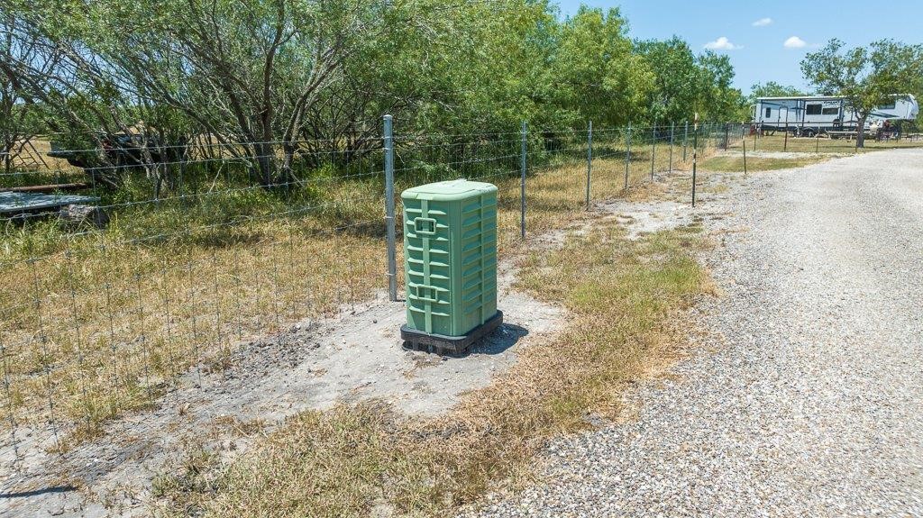 9223 County Road 2249 Sinton, TX 78387 - Photo 10 of 39 a view of a lake with a fountain