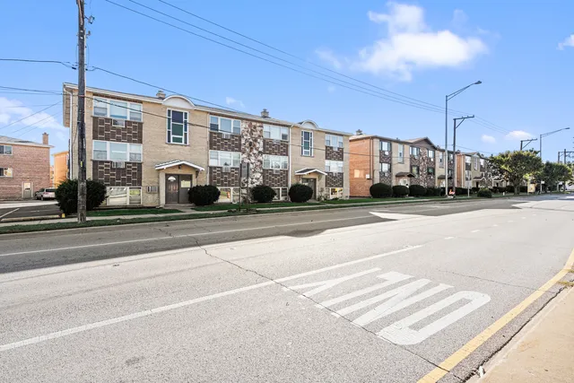 a view of a building with a street
