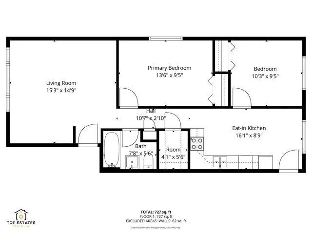 a kitchen with stainless steel appliances kitchen island granite countertop a stove refrigerator and cabinets