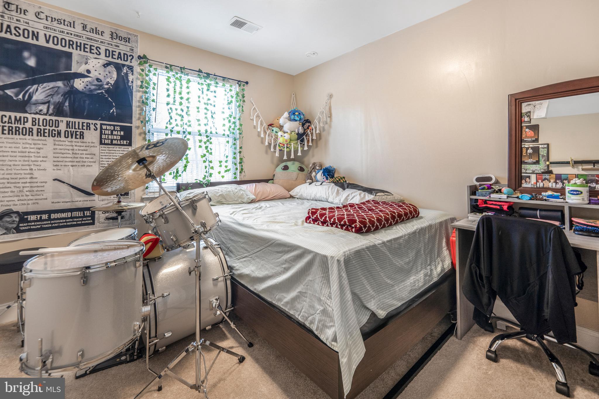 15307 Arbory Way, Unit 6 Laurel, MD 20707 - Photo 21 of 23 a bed room with a bed and a table