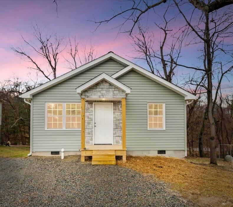127 State Pulaski, VA 24301 - Photo 1 of 35 a backyard of a house with large trees and wooden fence