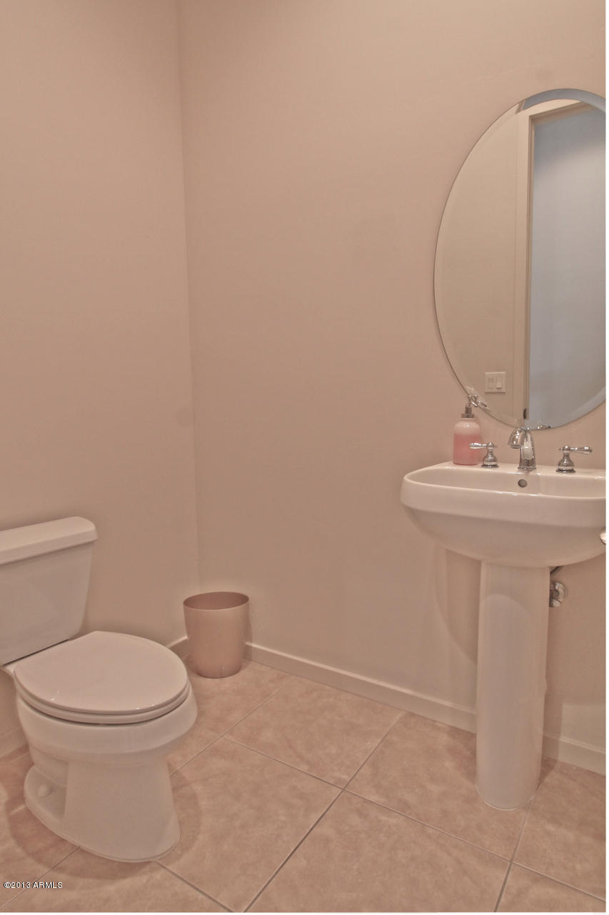 1711 West Brianna Road Phoenix, AZ 85085 - Photo 24 of 35 Powder Room with Pedestal Sink