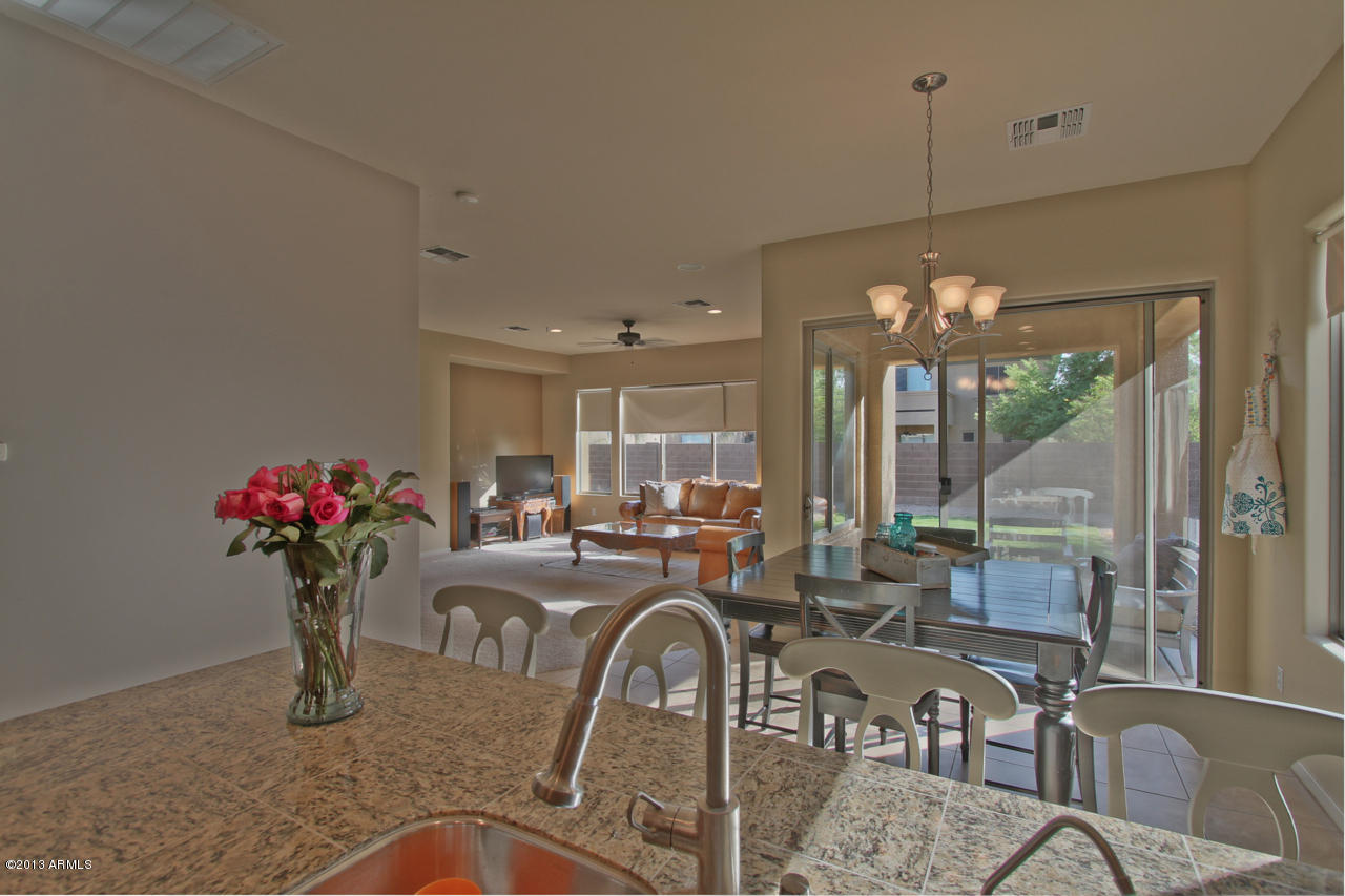 1711 West Brianna Road Phoenix, AZ 85085 - Photo 6 of 35 Open View from Kitchen into Family Room