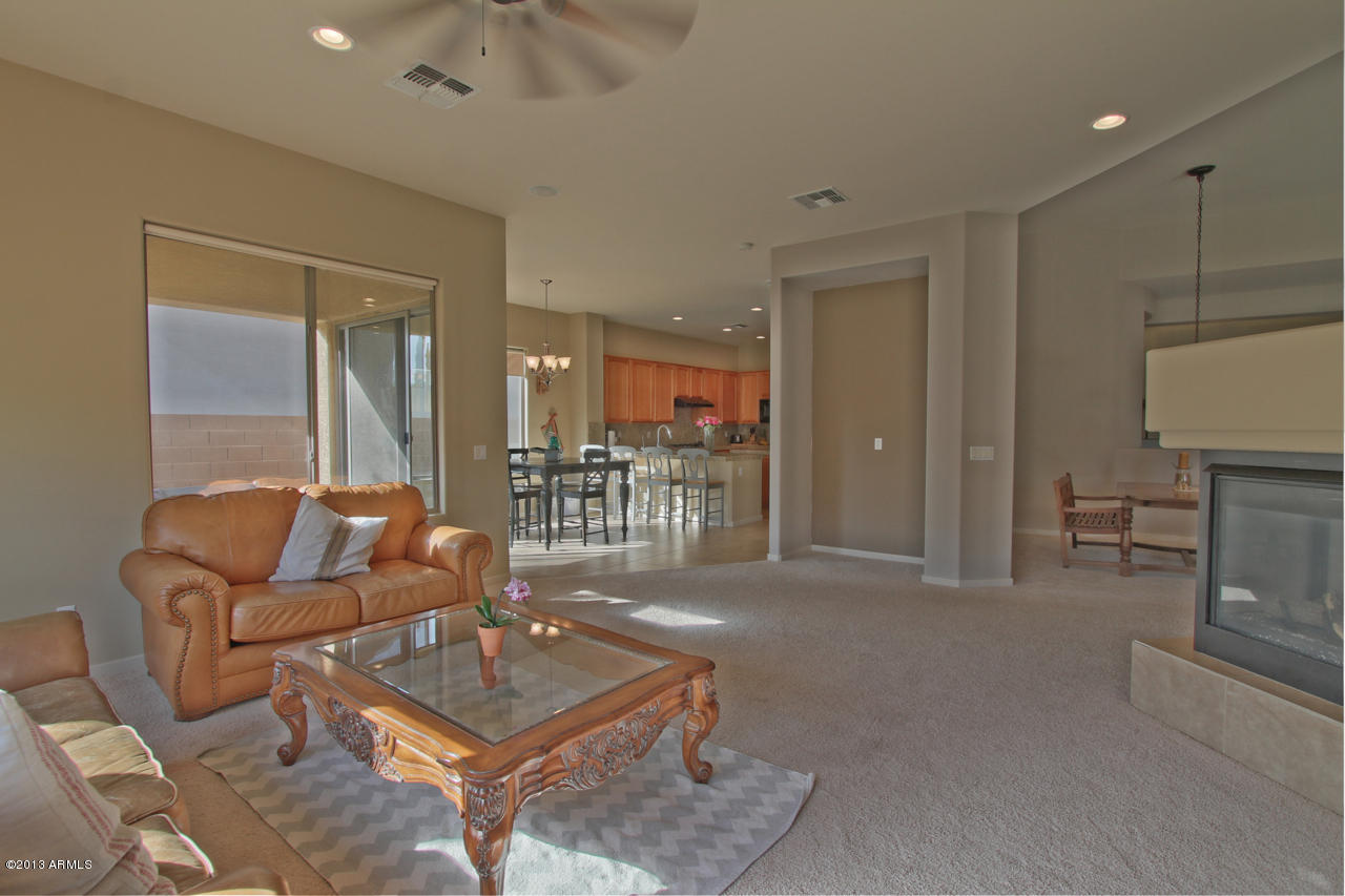 1711 West Brianna Road Phoenix, AZ 85085 - Photo 8 of 35 Family Room View into Kitchen