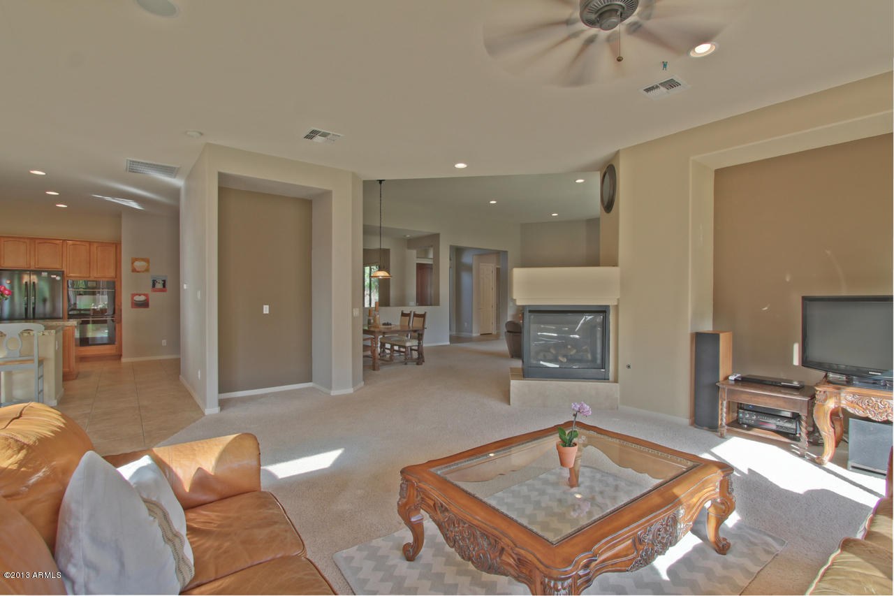 1711 West Brianna Road Phoenix, AZ 85085 - Photo 9 of 35 Family Room View into Living/Dining Room