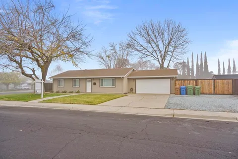 a house with trees in front of it