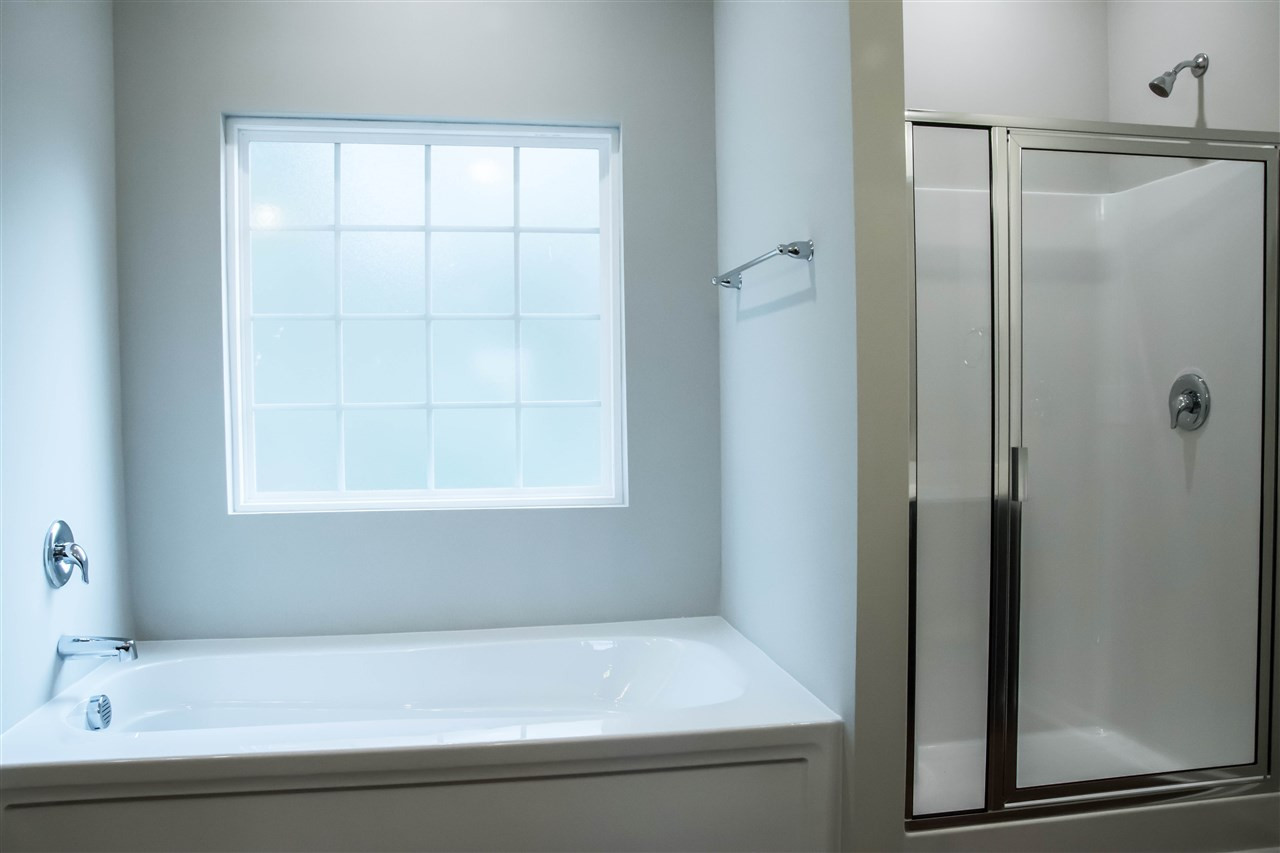 5317 A Fayetteville Road Durham, NC 27713 - Photo 5 of 30 Master bath with garden tub and standing shower with seat. Master Bath