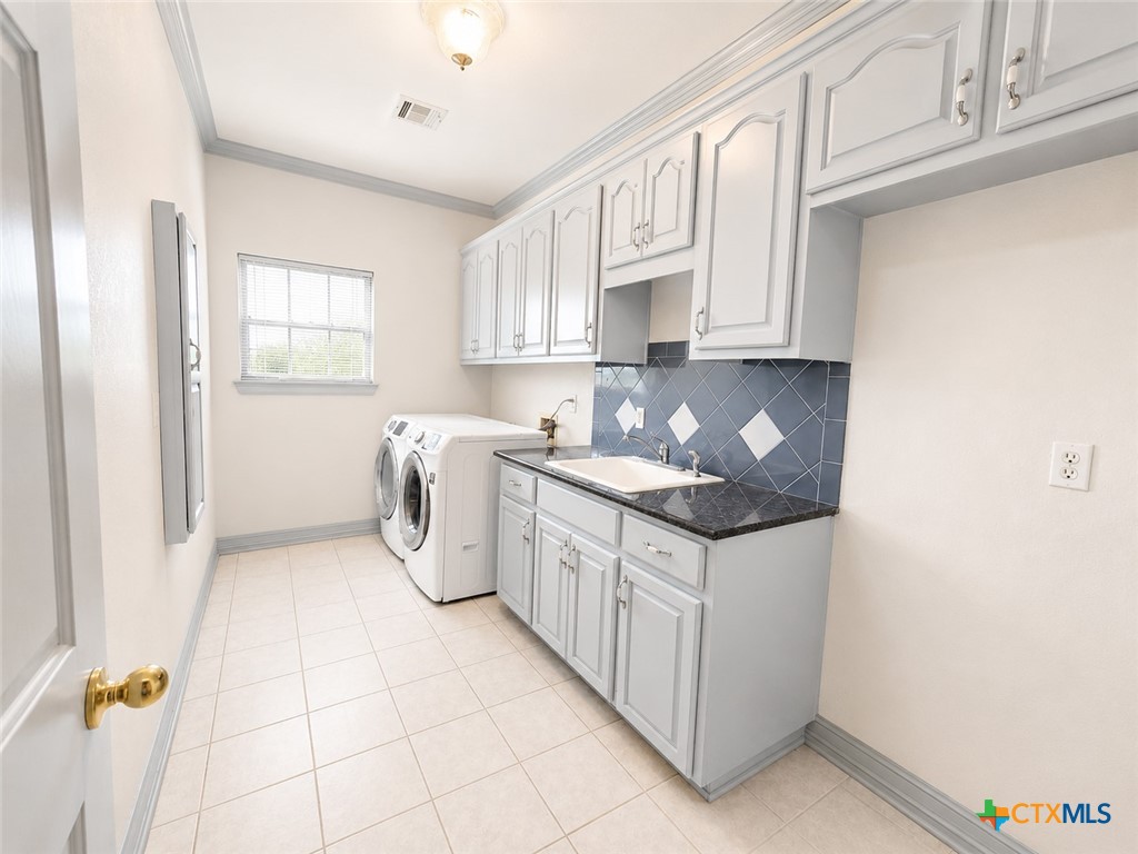 2450 West Amity Road Belton, TX 76513 - Photo 20 of 33 Lavish laundry and utility room!
