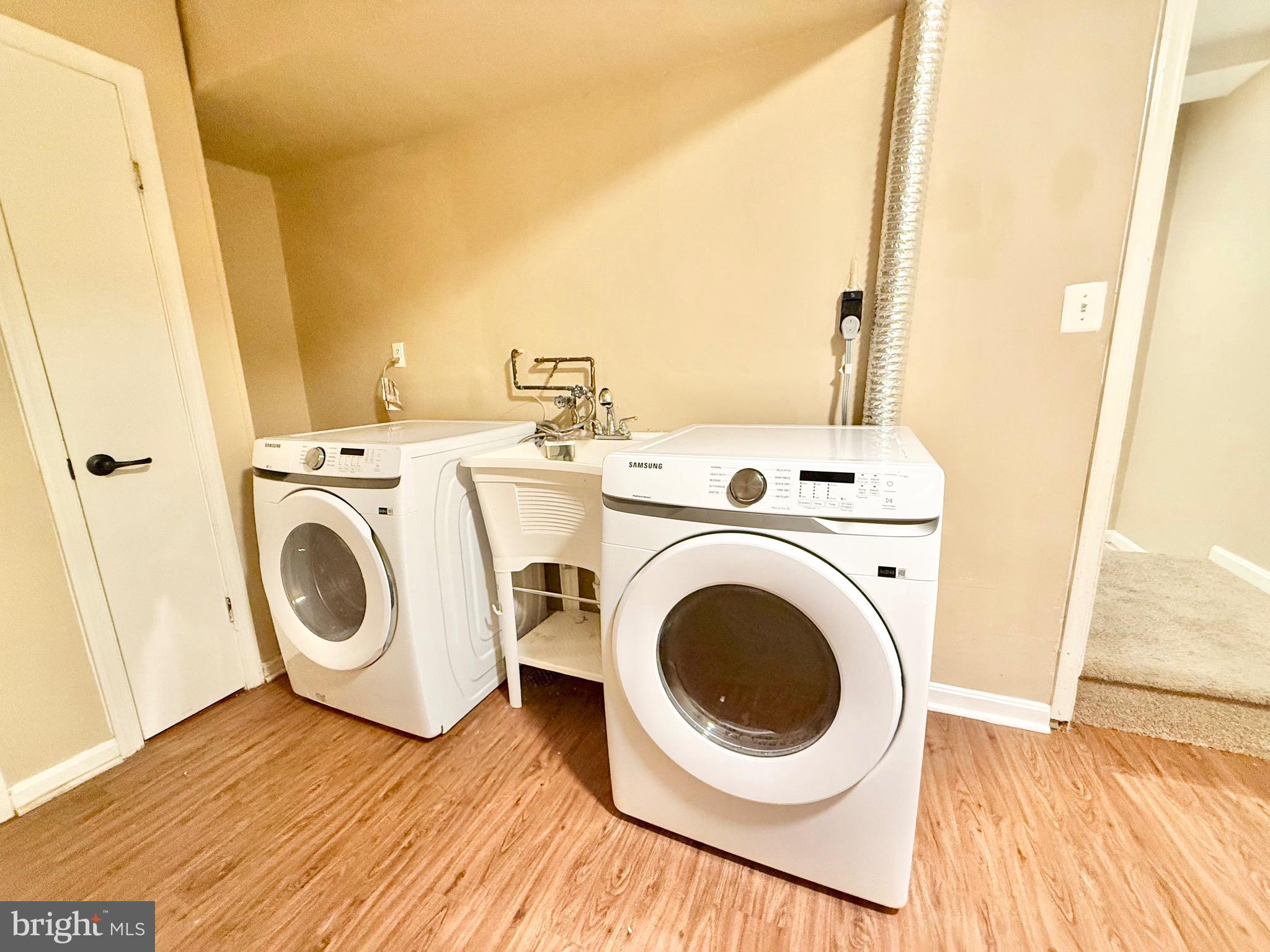 5439 Richenbacher Avenue Alexandria, VA 22304 - Photo 19 of 23 a view of a storage & utility room with dryer and washer
