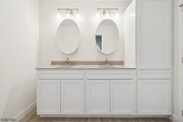 a bath room with a toilet and a bath tub