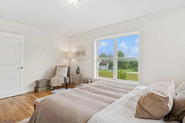 a view of backyard with deck and wooden floor