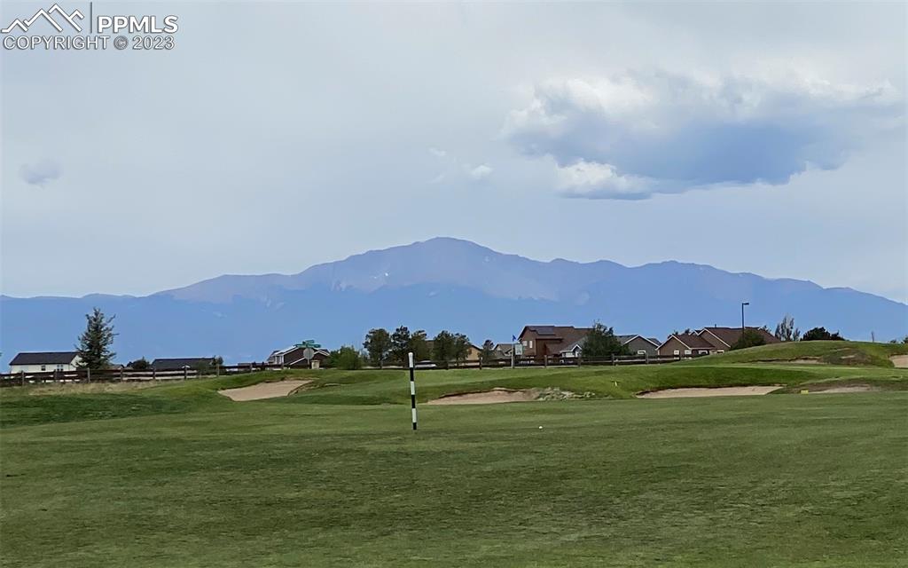 10751 Rolling Mesa Drive Peyton, CO 80831 - Photo 19 of 27 a view of an outdoor space with mountain in the background