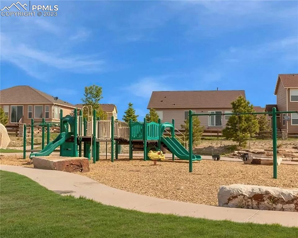 10751 Rolling Mesa Drive Peyton, CO 80831 - Photo 6 of 27 a view of a house with a yard