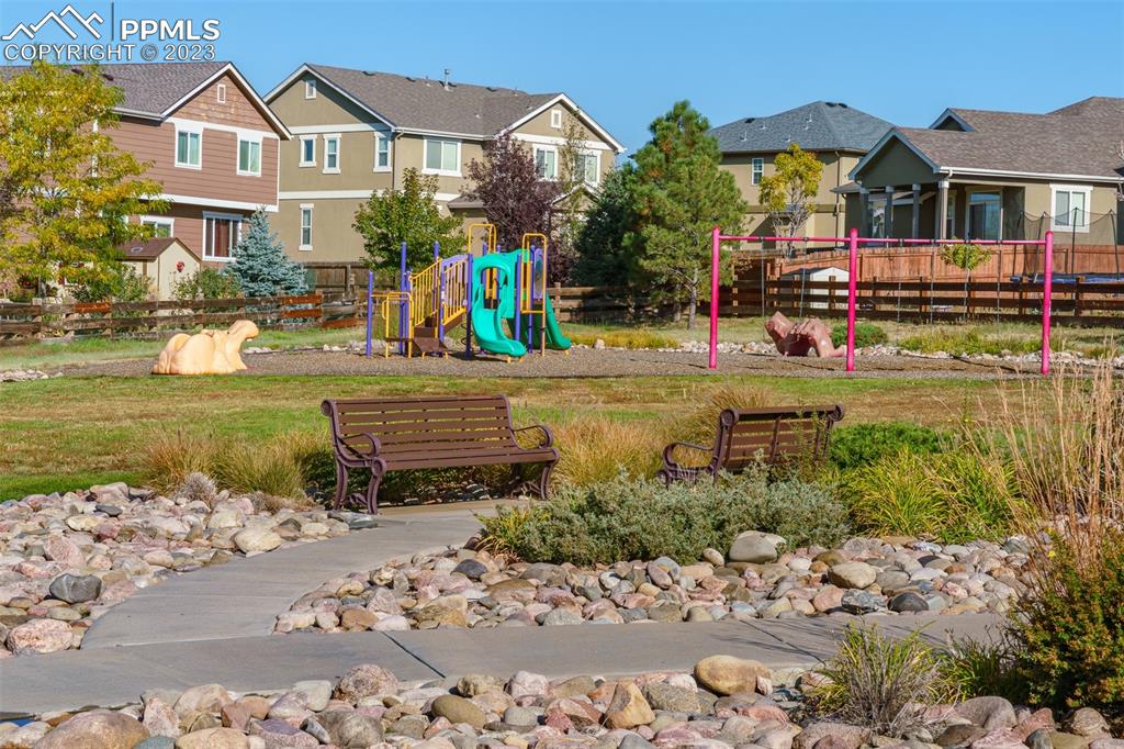 10751 Rolling Mesa Drive Peyton, CO 80831 - Photo 7 of 27 a front view of a house with a yard