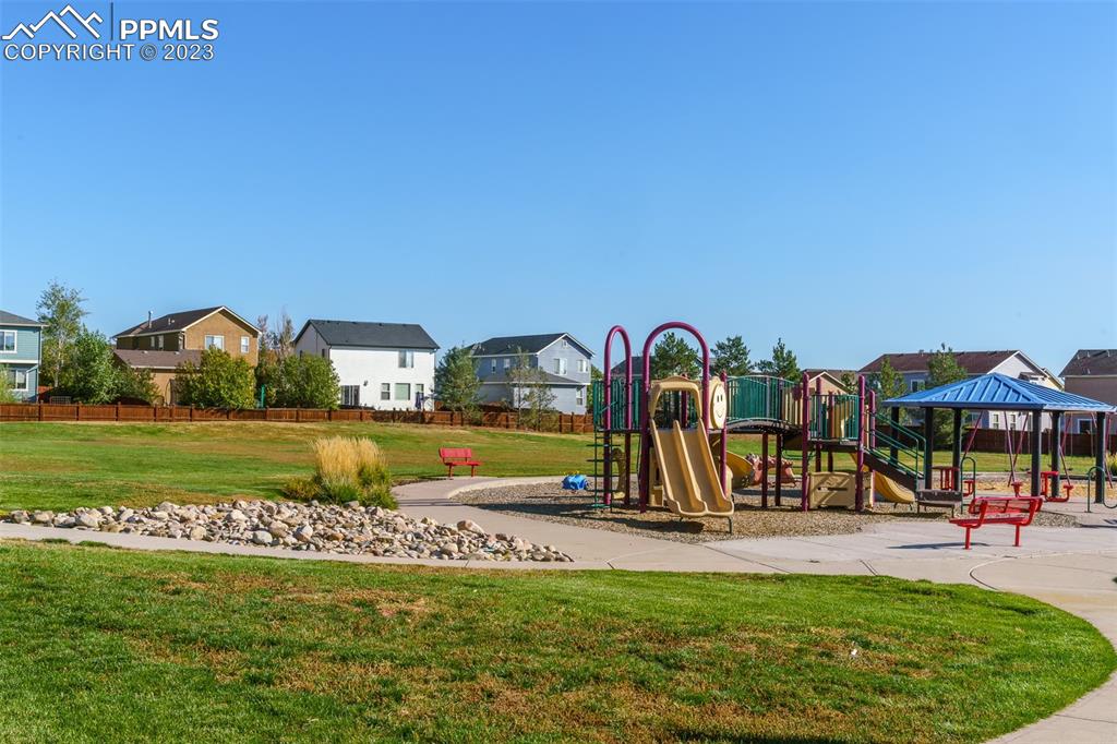 10751 Rolling Mesa Drive Peyton, CO 80831 - Photo 8 of 27 a view of a park with swings and slides
