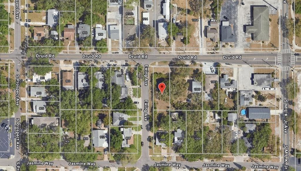 a city street filled with lots of tall buildings