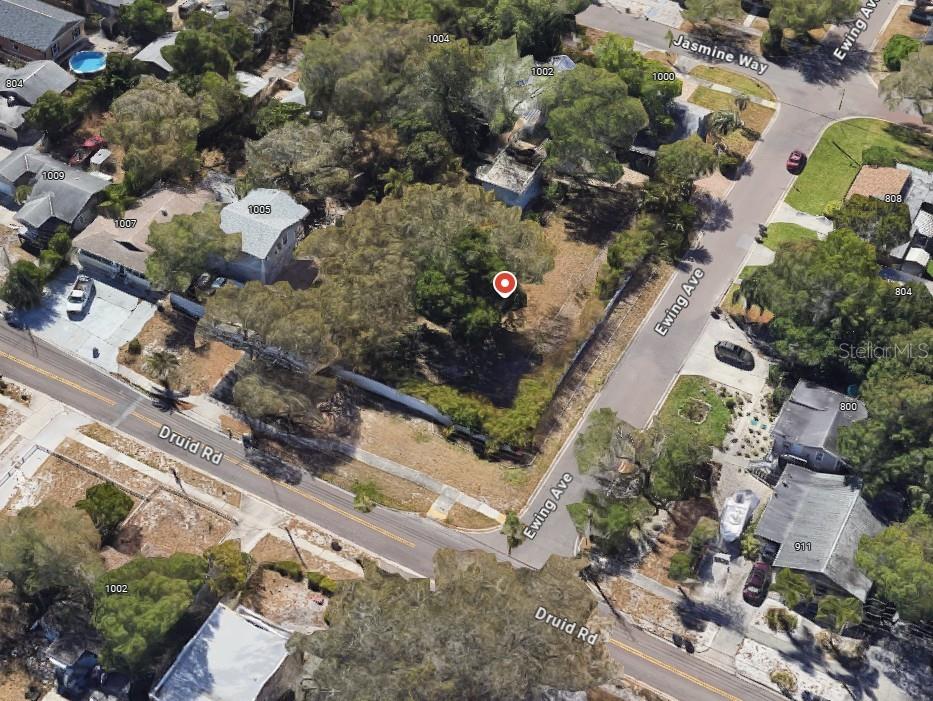 1001 Druid Road Clearwater, FL 33756 - Photo 3 of 4 an aerial view of a residential houses with outdoor space