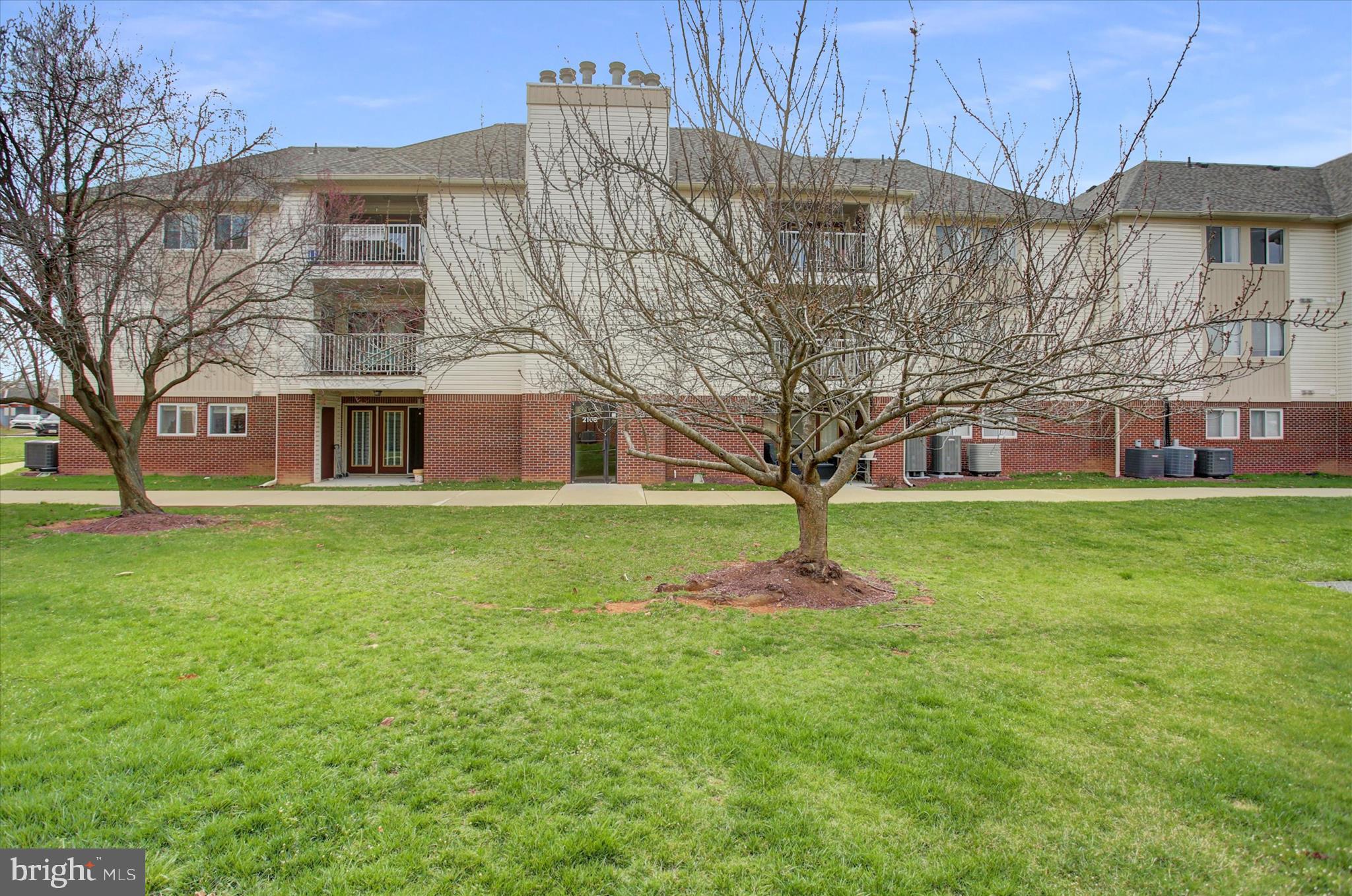 2108 Whitehall Road, Unit BC Frederick, MD 21702 - Photo 2 of 35 a front view of house with yard