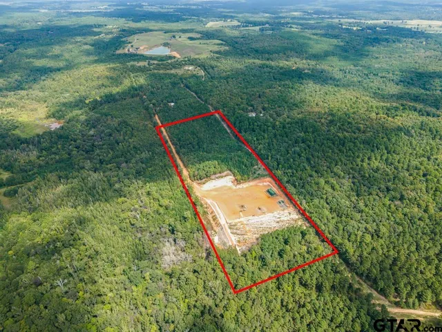 a view of a yard with an outdoor space