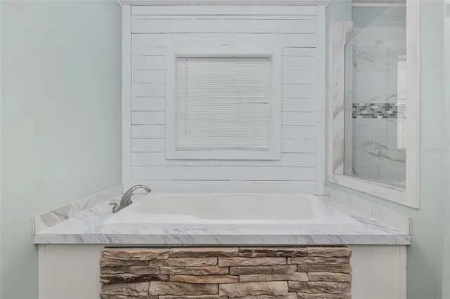 a bathroom with bathtub