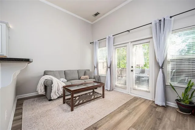 a view of a roof deck with furniture