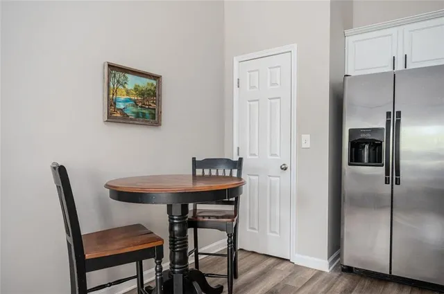 a view of a balcony with furniture