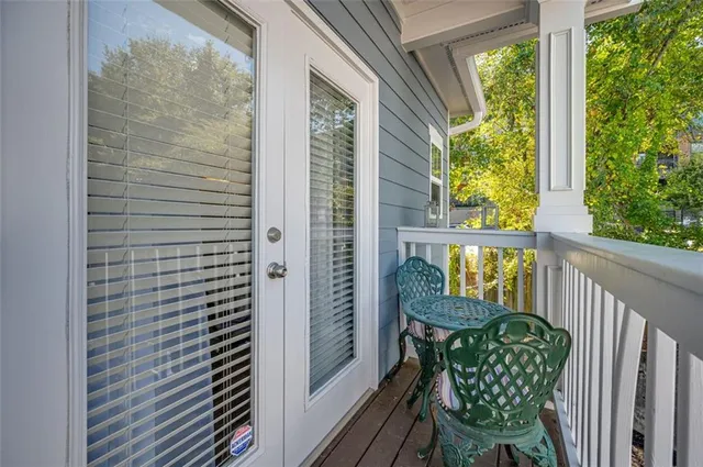 a view of a backyard with sitting area