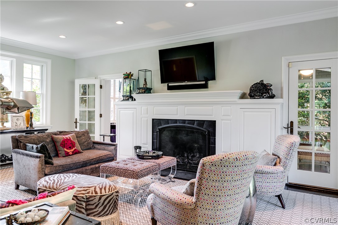 14 Roslyn Road Richmond, VA 23226 - Photo 11 of 49 a living room with furniture flat screen tv and a fireplace