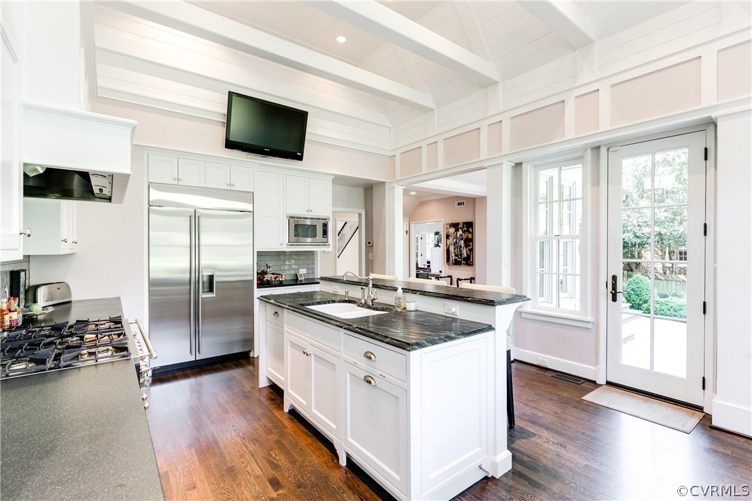14 Roslyn Road Richmond, VA 23226 - Photo 16 of 49 a kitchen with stainless steel appliances granite countertop a stove a sink and a refrigerator