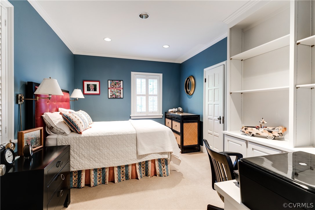 14 Roslyn Road Richmond, VA 23226 - Photo 32 of 49 a bedroom with a bed and wooden floor