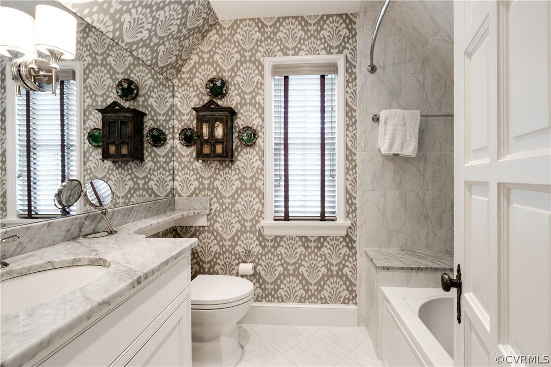 14 Roslyn Road Richmond, VA 23226 - Photo 33 of 49 a bathroom with a granite countertop bathtub sink vanity mirror and toilet