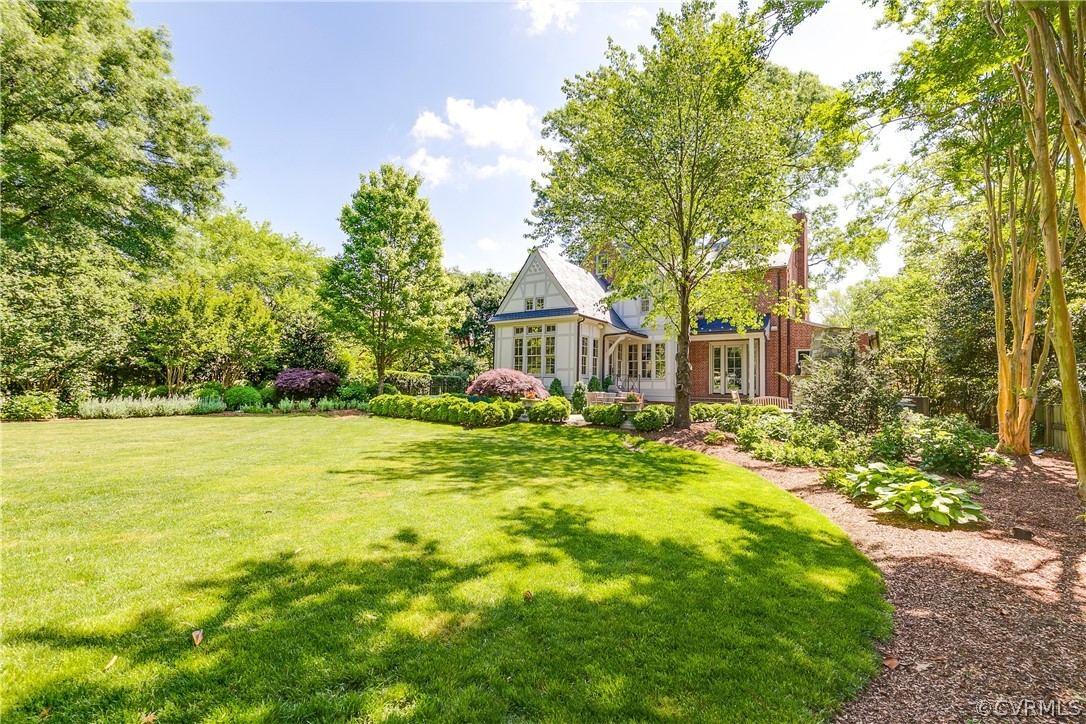 14 Roslyn Road Richmond, VA 23226 - Photo 40 of 49 a front view of house with yard and trees in the background