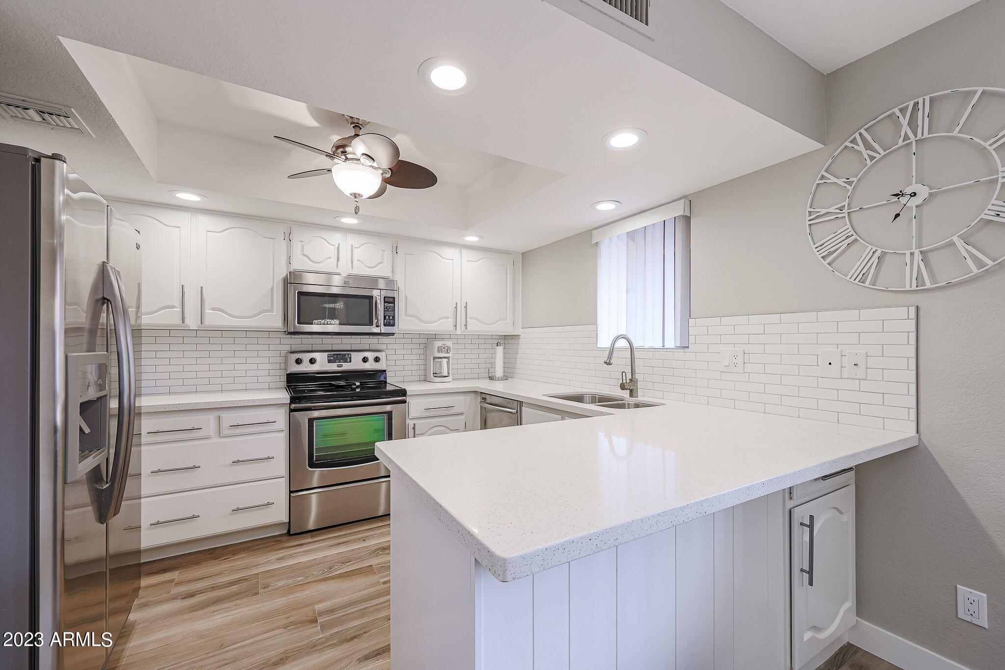 4303 East Cactus Road, Unit 137 Phoenix, AZ 85032 - Photo 1 of 22 9-137 QUARTZ COUNTER KITCHEN