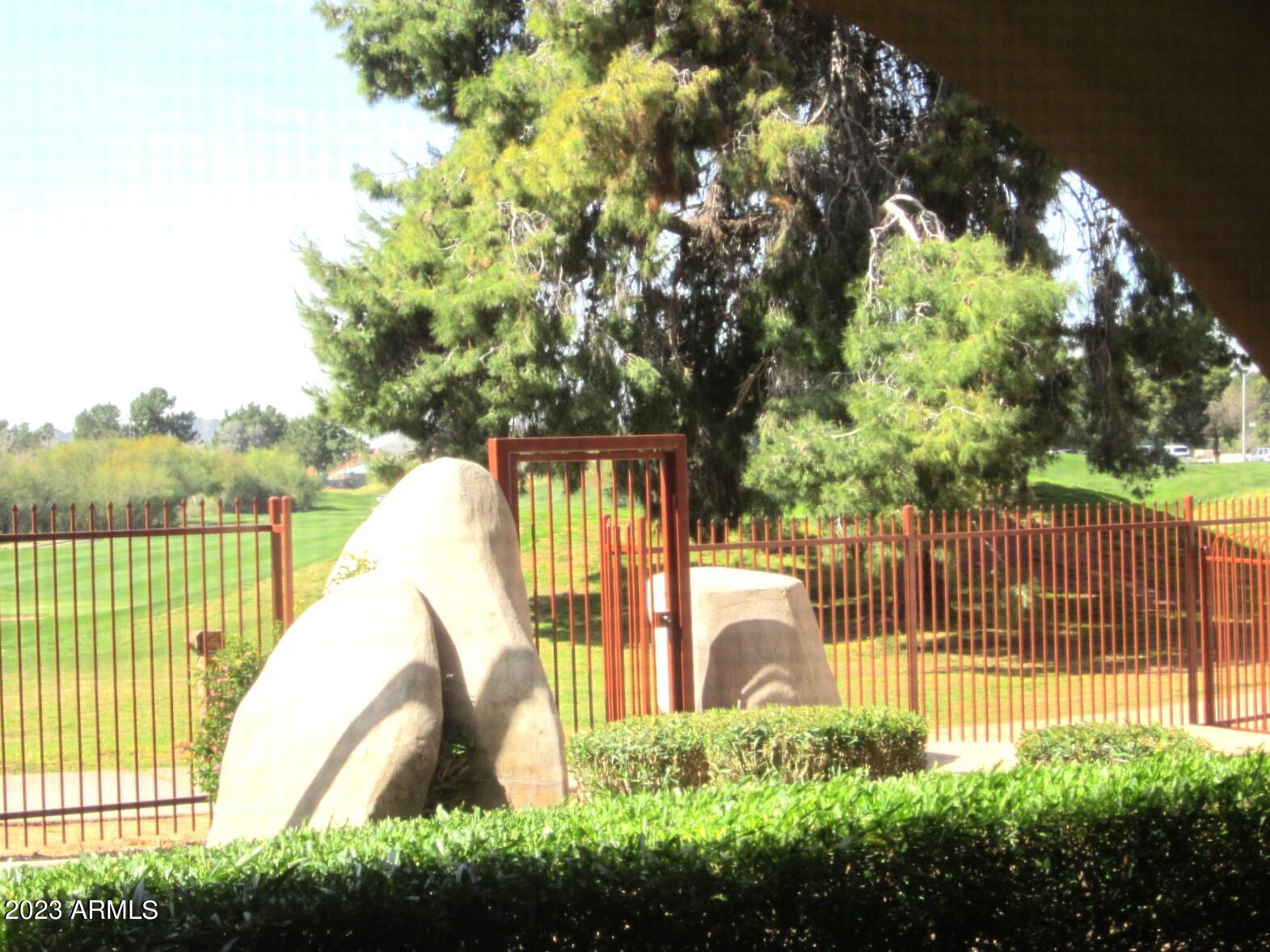 4303 East Cactus Road, Unit 137 Phoenix, AZ 85032 - Photo 12 of 22 9 137 GATE TO GOLF COURSE PATH