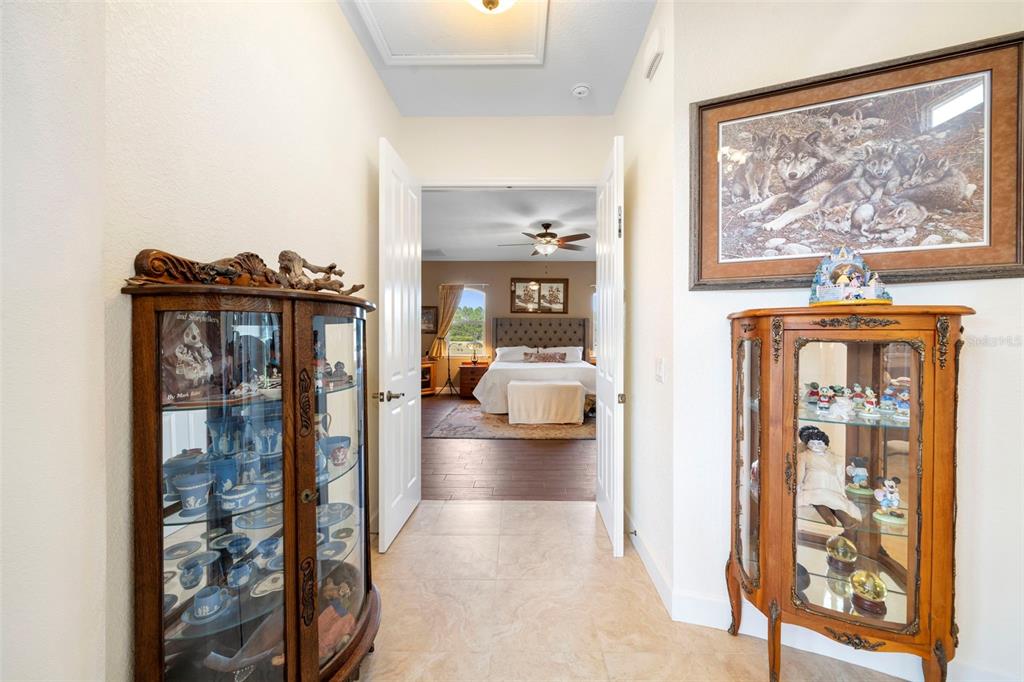 13023 Sweet Hill Road Polk City, FL 33868 - Photo 18 of 49 a view of living room with furniture and a painting on the wall