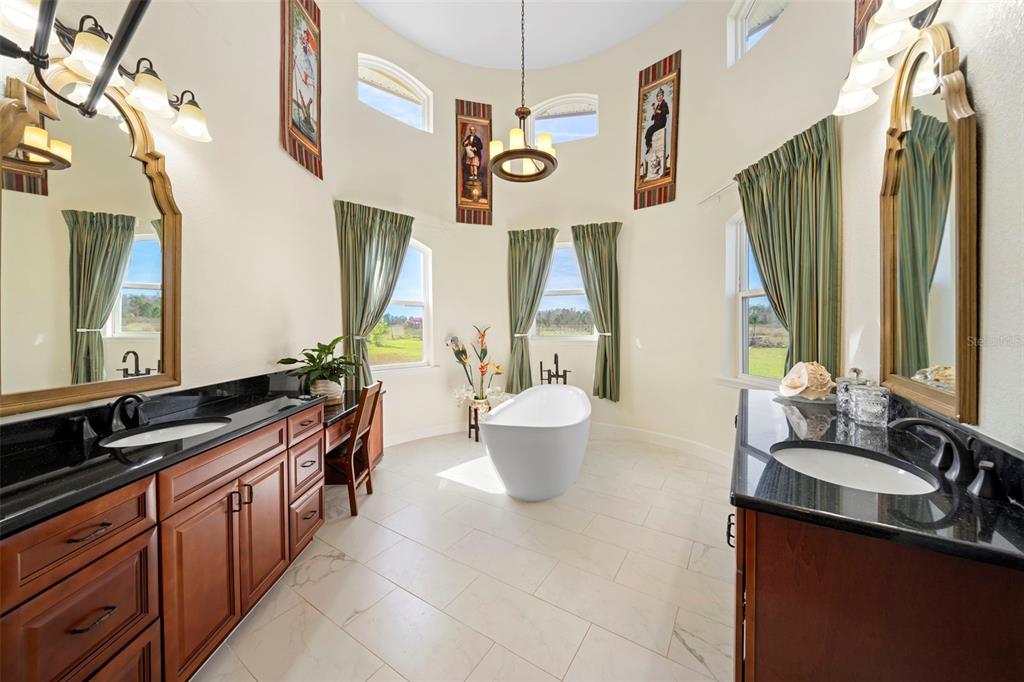 13023 Sweet Hill Road Polk City, FL 33868 - Photo 30 of 49 a kitchen with a sink and a stove