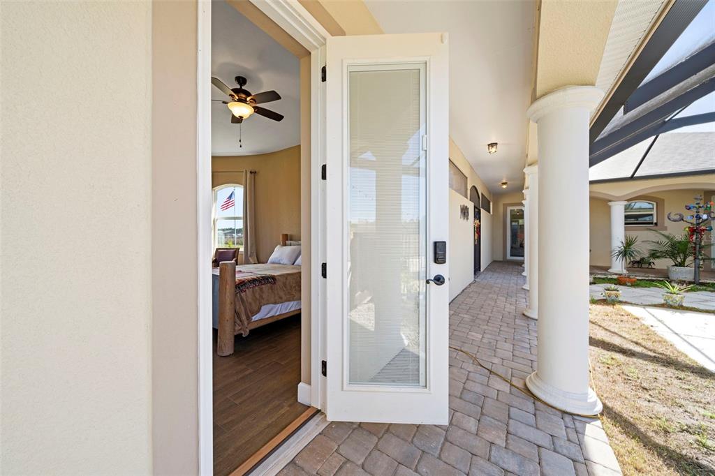 13023 Sweet Hill Road Polk City, FL 33868 - Photo 42 of 49 a view of a bedroom from balcony
