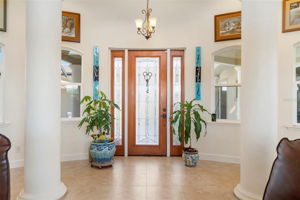 13023 Sweet Hill Road Polk City, FL 33868 - Photo 46 of 49 a view of an entryway with wooden floor