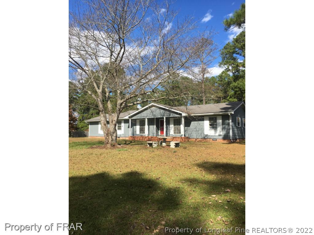 322 Old Farm Road Raeford, NC 28376 - Photo 1 of 11 a view of a house with a yard
