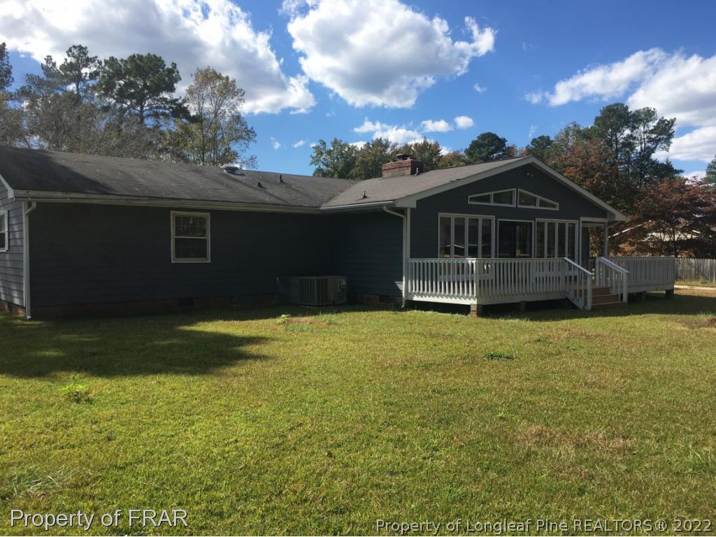 322 Old Farm Road Raeford, NC 28376 - Photo 2 of 11 a front view of a house with a garden