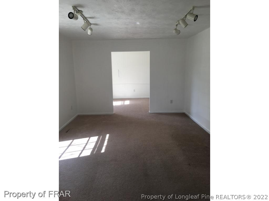 322 Old Farm Road Raeford, NC 28376 - Photo 4 of 11 a view of an empty room