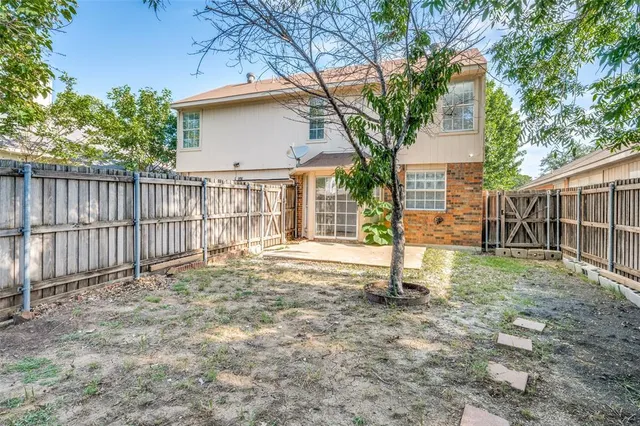 a house view with a garden