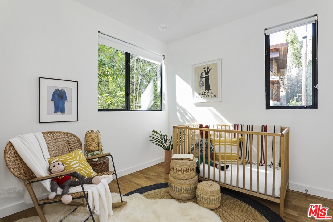 1508 Elevado Street Los Angeles, CA 90026 - Photo 25 of 38 a living room with furniture and a window