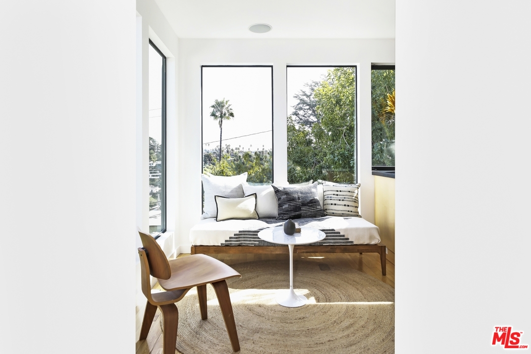 1508 Elevado Street Los Angeles, CA 90026 - Photo 9 of 38 a living room with furniture and a large window
