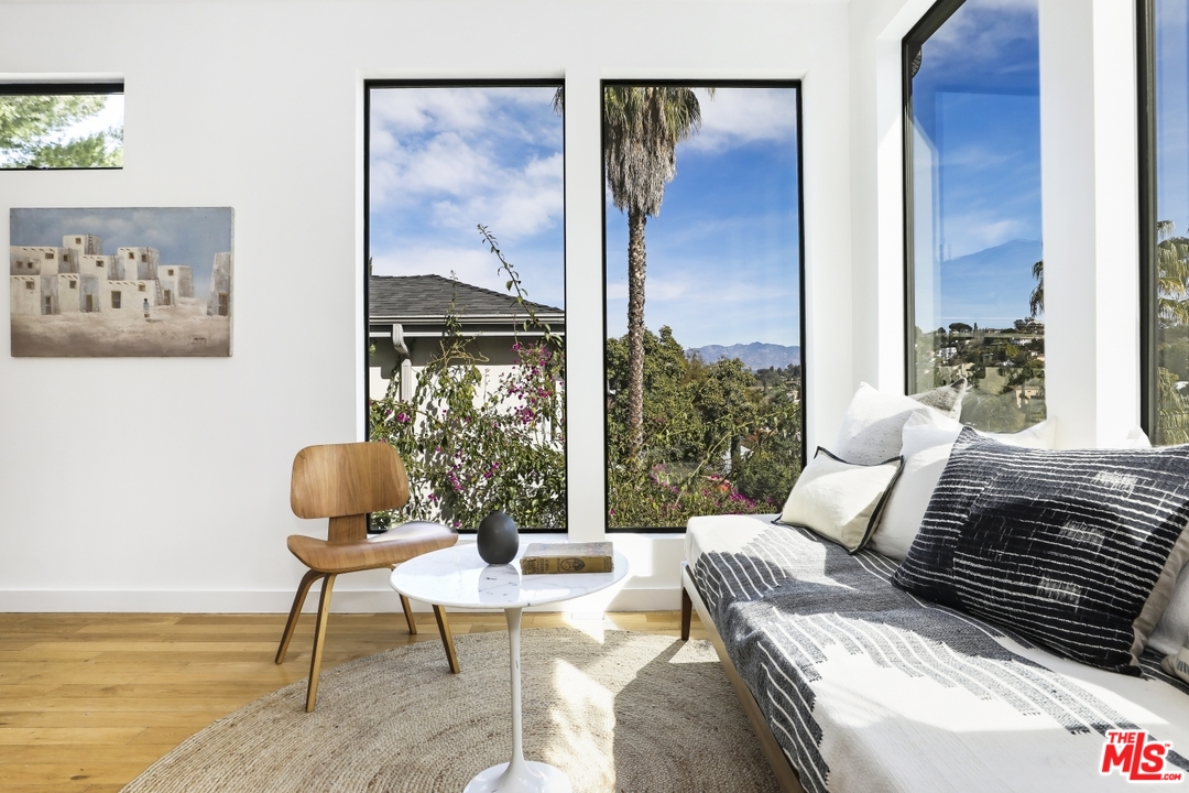 1508 Elevado Street Los Angeles, CA 90026 - Photo 10 of 38 a living room with furniture and a window