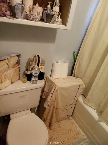 a close view of laundry room with a washer and dryer