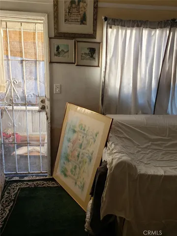 a kitchen with sink and cabinets