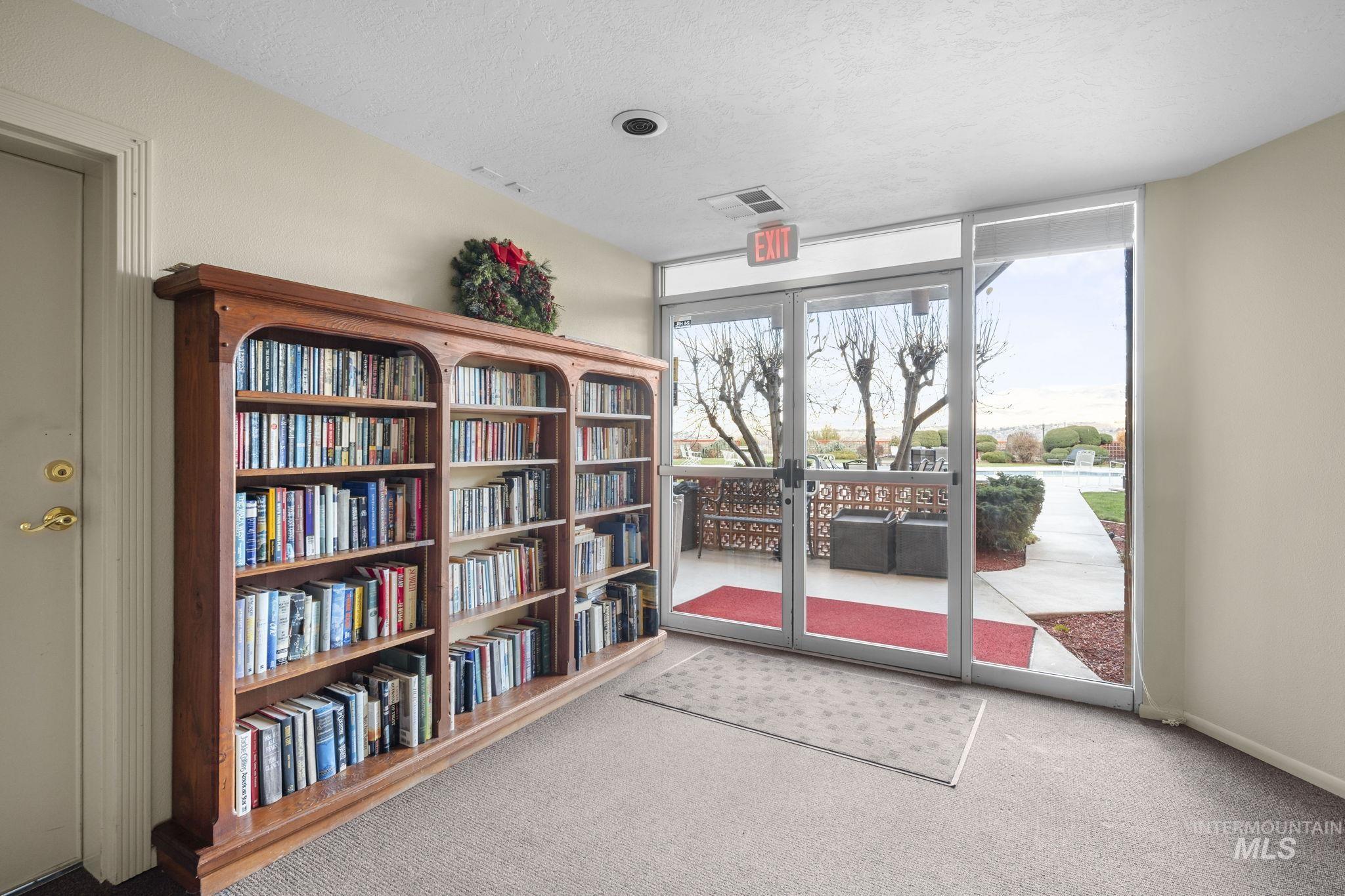 3701 West Crescent Rim Drive, Unit 103 Boise, ID 83706 - Photo 32 of 32 Library area inside of sitting area in lobby area.