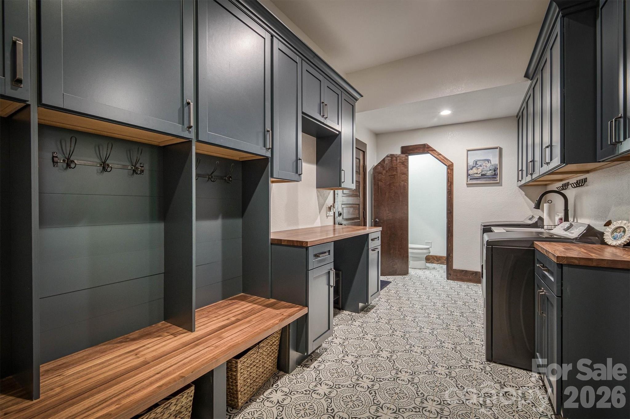 2243 Cottage Park Road Morganton, NC 28655 - Photo 23 of 48 a kitchen with stainless steel appliances kitchen island granite countertop a refrigerator a sink and dishwasher